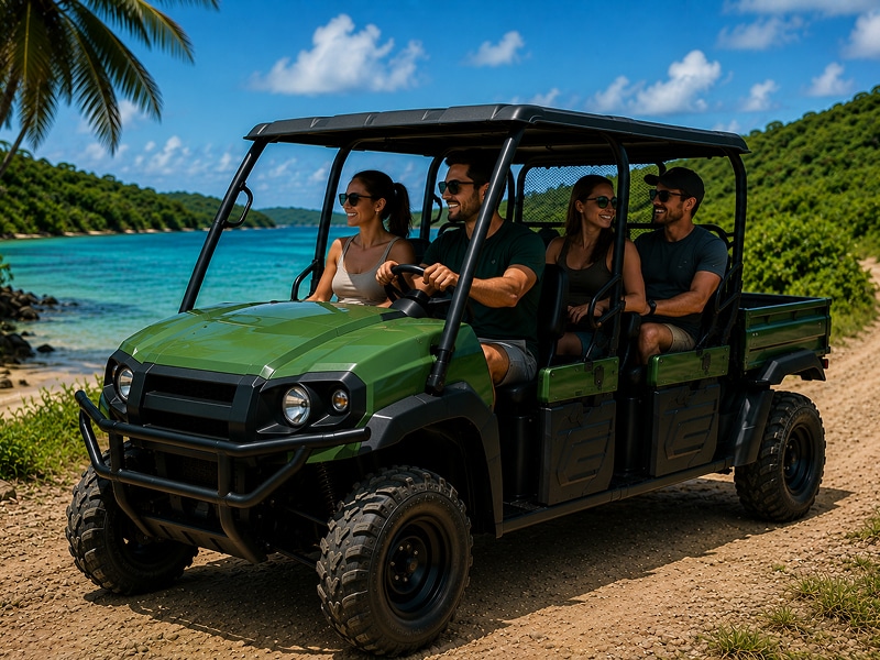 Group riding a green 4-passenger Kawasaki Mule UTV in Vieques